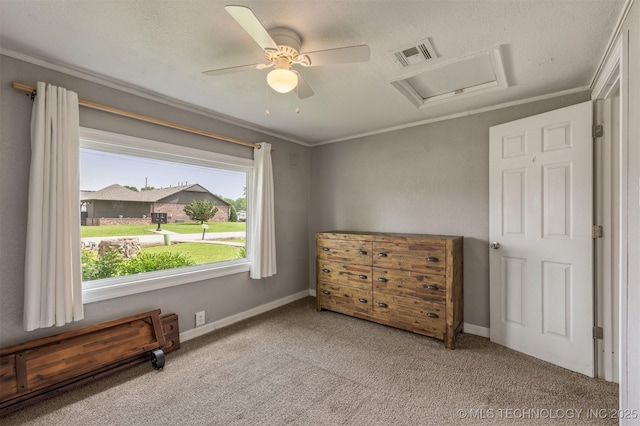 705 W Center St, Collinsville, OK 74021 - carpeted bedroom with attic access, ornamental molding, and a ceiling fan
