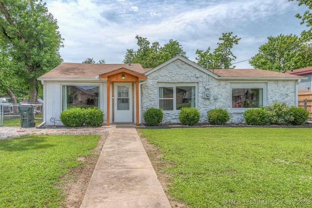 705 W Center St, Collinsville, OK 74021 - bungalow-style house with stone siding