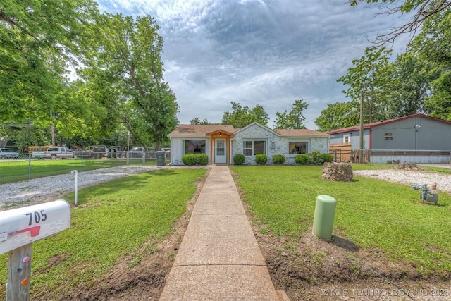 705 W Center St, Collinsville, OK 74021 - view of front of home featuring stone siding