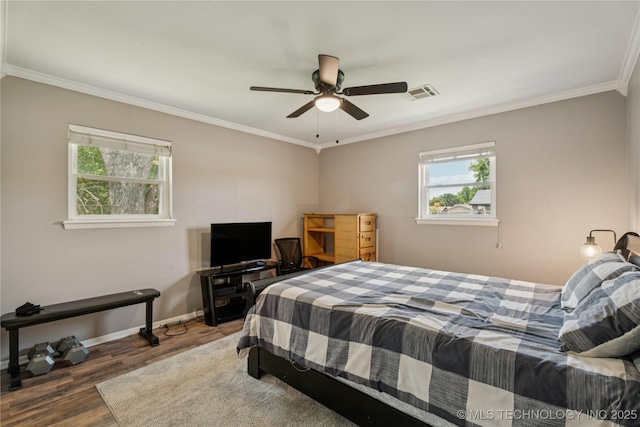 810 N 3rd St, Jenks, OK 74037 - bedroom featuring multiple windows, crown molding, wood finished floors, and ceiling fan
