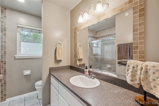 810 N 3rd St, Jenks, OK 74037 - full bath featuring vanity, a shower stall, and tile patterned floors