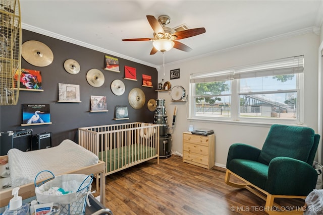 810 N 3rd St, Jenks, OK 74037 - bedroom with wood finished floors, crown molding, and ceiling fan