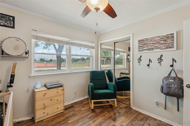 810 N 3rd St, Jenks, OK 74037 - living area with crown molding, wood finished floors, ceiling fan, and plenty of natural light