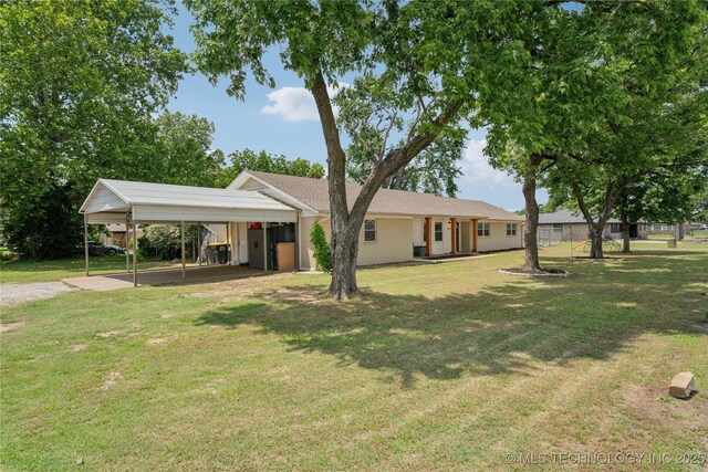 810 N 3rd St, Jenks, OK 74037 - ranch-style home featuring a detached carport, a front lawn, and gravel driveway