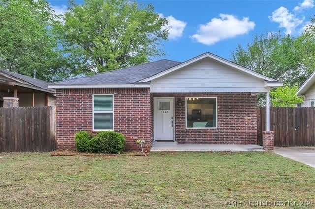 1332 N Denver Ave, Tulsa, OK 74106 - view of front of house with brick siding
