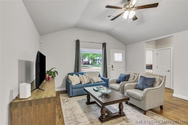 1332 N Denver Ave, Tulsa, OK 74106 - living room with wood finished floors, a ceiling fan, and lofted ceiling