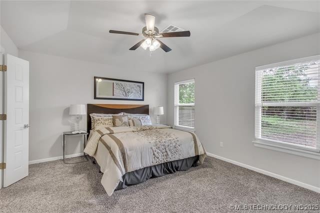 1332 N Denver Ave, Tulsa, OK 74106 - carpeted bedroom with baseboards and a ceiling fan