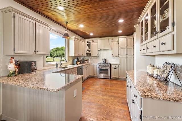 72878 S 230th Rd, Wagoner, OK 74467 - kitchen with appliances with stainless steel finishes, wooden ceiling, a peninsula, custom exhaust hood, and wood finished floors