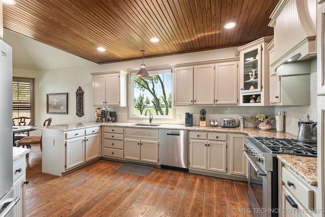 72878 S 230th Rd, Wagoner, OK 74467 - kitchen featuring appliances with stainless steel finishes, wood ceiling, a peninsula, tasteful backsplash, and hanging light fixtures
