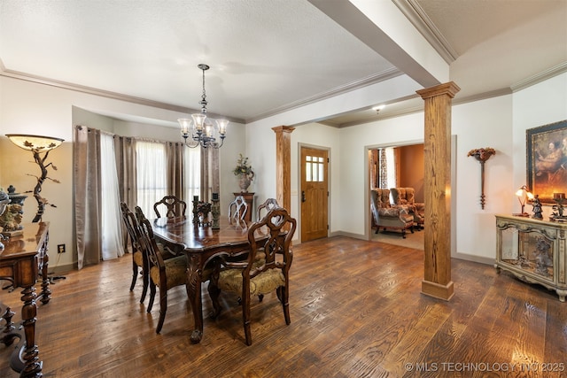 72878 S 230th Rd, Wagoner, OK 74467 - dining area featuring ornate columns, ornamental molding, a chandelier, plenty of natural light, and wood finished floors