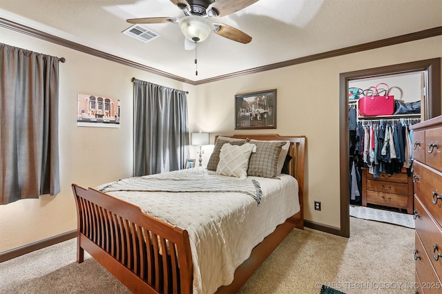72878 S 230th Rd, Wagoner, OK 74467 - carpeted bedroom with a walk in closet, a closet, crown molding, and a ceiling fan