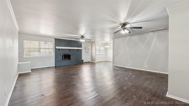 2974 E 77th Pl, Tulsa, OK 74136 - unfurnished living room with ceiling fan, plenty of natural light, a brick fireplace, crown molding, and wood finished floors