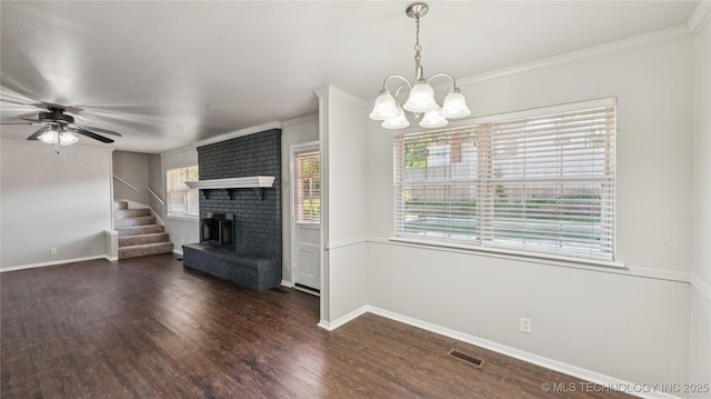 2974 E 77th Pl, Tulsa, OK 74136 - unfurnished living room with a brick fireplace, a chandelier, wood finished floors, stairway, and ornamental molding
