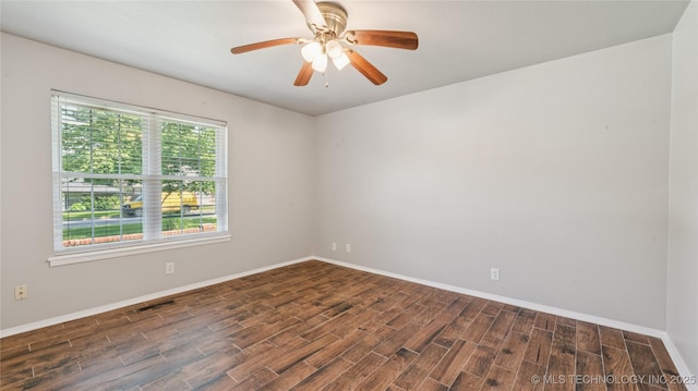 2974 E 77th Pl, Tulsa, OK 74136 - spare room with dark wood finished floors and ceiling fan