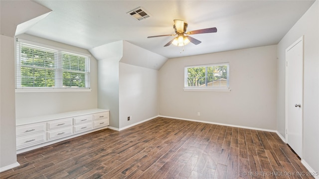 2974 E 77th Pl, Tulsa, OK 74136 - additional living space with dark wood-style floors, ceiling fan, and lofted ceiling