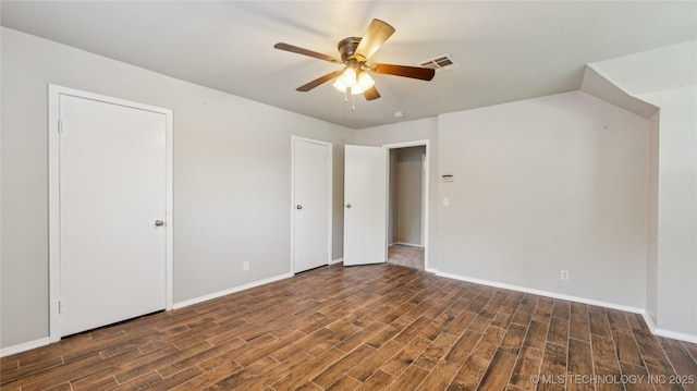 2974 E 77th Pl, Tulsa, OK 74136 - unfurnished bedroom with wood finished floors and ceiling fan