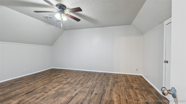 2974 E 77th Pl, Tulsa, OK 74136 - additional living space with wood finished floors, a ceiling fan, a textured ceiling, and vaulted ceiling