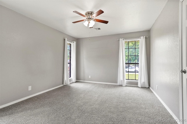 13050 S 143rd Ave E, Broken Arrow, OK 74011 - spare room with a ceiling fan and carpet flooring