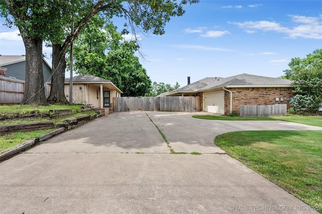 13050 S 143rd Ave E, Broken Arrow, OK 74011 - view of front of property with driveway, a garage, brick siding, and roof with shingles
