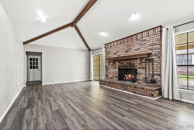 13050 S 143rd Ave E, Broken Arrow, OK 74011 - unfurnished living room featuring wood finished floors, beam ceiling, a brick fireplace, and high vaulted ceiling