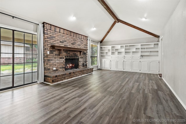 13050 S 143rd Ave E, Broken Arrow, OK 74011 - unfurnished living room featuring beam ceiling, wood finished floors, a brick fireplace, and high vaulted ceiling