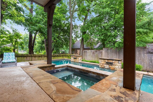 9034 S Maplewood Ave, Tulsa, OK 74137 - view of pool featuring an in-ground hot tub, a fenced backyard, and a patio area