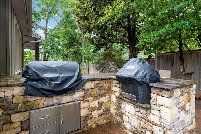 9034 S Maplewood Ave, Tulsa, OK 74137 - view of patio with exterior kitchen