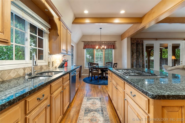 9034 S Maplewood Ave, Tulsa, OK 74137 - kitchen featuring stainless steel appliances, a chandelier, light wood-style flooring, backsplash, and pendant lighting