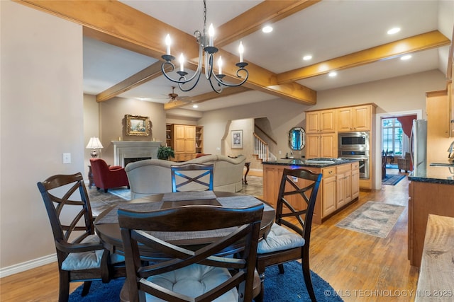 9034 S Maplewood Ave, Tulsa, OK 74137 - dining area with beamed ceiling, light wood-style floors, a fireplace, recessed lighting, and ceiling fan
