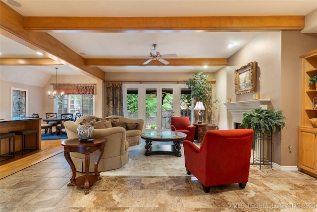 9034 S Maplewood Ave, Tulsa, OK 74137 - living area with beamed ceiling, ceiling fan, stone tile flooring, a chandelier, and a fireplace