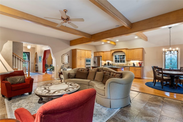 9034 S Maplewood Ave, Tulsa, OK 74137 - living room featuring a chandelier, a ceiling fan, beamed ceiling, recessed lighting, and stairway
