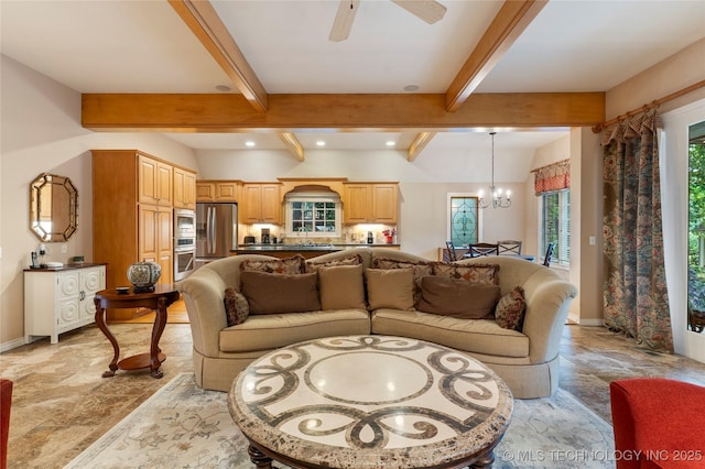 9034 S Maplewood Ave, Tulsa, OK 74137 - living area featuring stone tile floors, a chandelier, beamed ceiling, ceiling fan, and recessed lighting