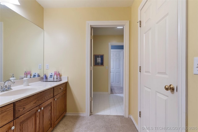 9034 S Maplewood Ave, Tulsa, OK 74137 - bathroom featuring vanity and tile patterned flooring