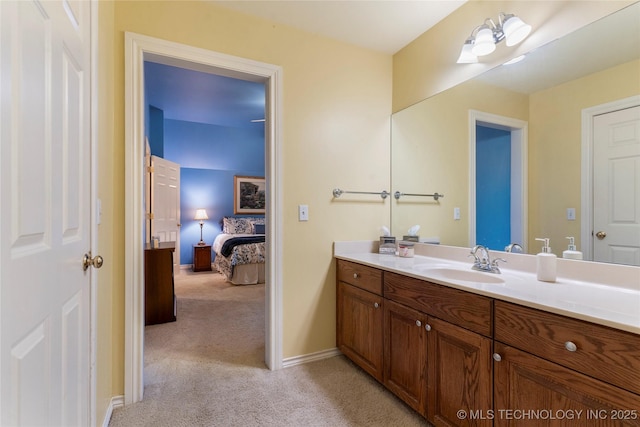 9034 S Maplewood Ave, Tulsa, OK 74137 - ensuite bathroom with vanity and baseboards