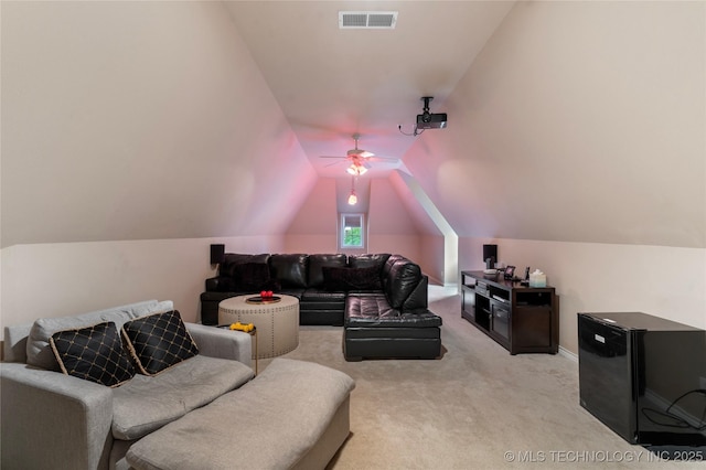 9034 S Maplewood Ave, Tulsa, OK 74137 - cinema room with light colored carpet, a ceiling fan, and vaulted ceiling