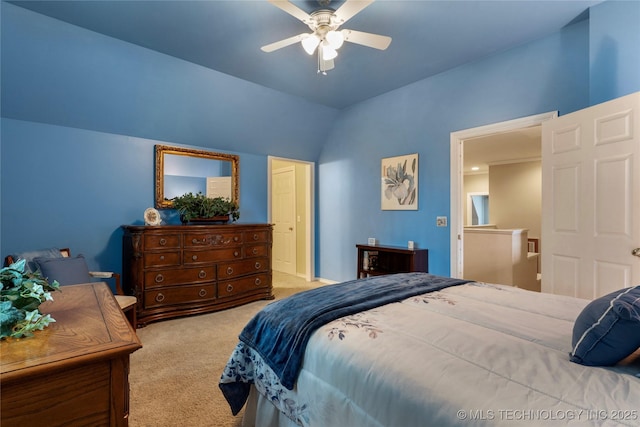 9034 S Maplewood Ave, Tulsa, OK 74137 - bedroom featuring light carpet, lofted ceiling, and a ceiling fan