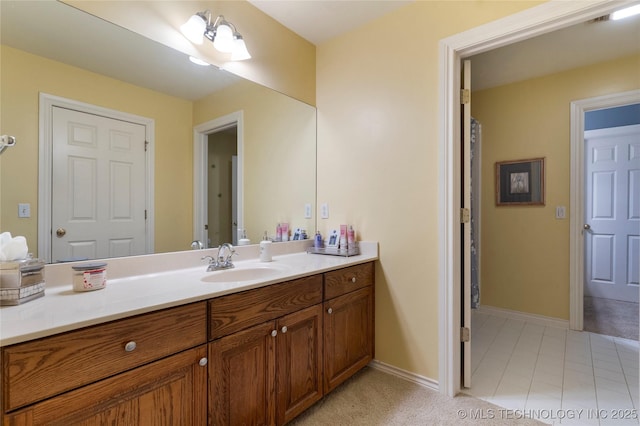9034 S Maplewood Ave, Tulsa, OK 74137 - full bathroom with vanity and tile patterned flooring