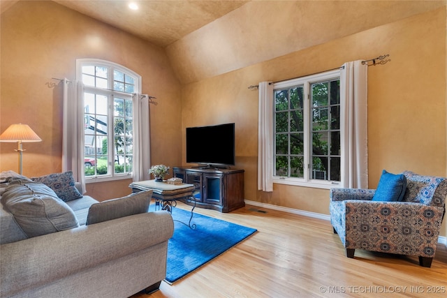 9034 S Maplewood Ave, Tulsa, OK 74137 - living area with wood finished floors, plenty of natural light, high vaulted ceiling, and recessed lighting