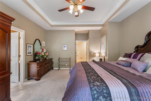 9034 S Maplewood Ave, Tulsa, OK 74137 - bedroom with light carpet, ornamental molding, a tray ceiling, ensuite bathroom, and a ceiling fan