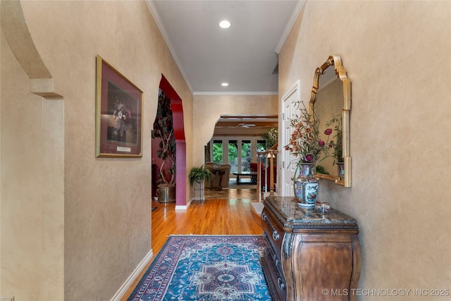 9034 S Maplewood Ave, Tulsa, OK 74137 - hallway featuring crown molding, wood finished floors, and recessed lighting