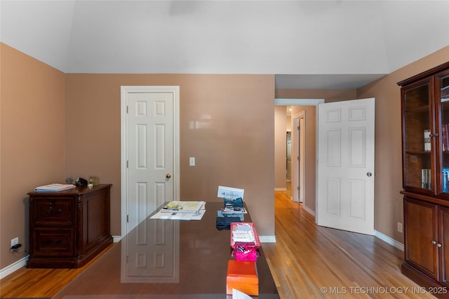 9034 S Maplewood Ave, Tulsa, OK 74137 - office featuring wood finished floors and lofted ceiling