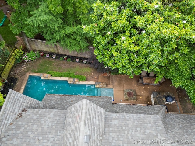 9034 S Maplewood Ave, Tulsa, OK 74137 - view of swimming pool featuring a fenced backyard