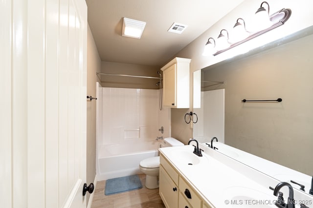 18312 E 46th St, Tulsa, OK 74134 - full bathroom featuring double vanity, bathing tub / shower combination, and wood finished floors