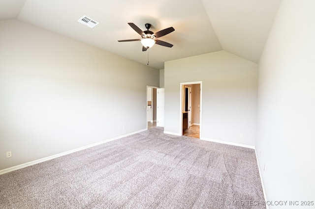 18312 E 46th St, Tulsa, OK 74134 - unfurnished bedroom featuring vaulted ceiling, light colored carpet, and ceiling fan
