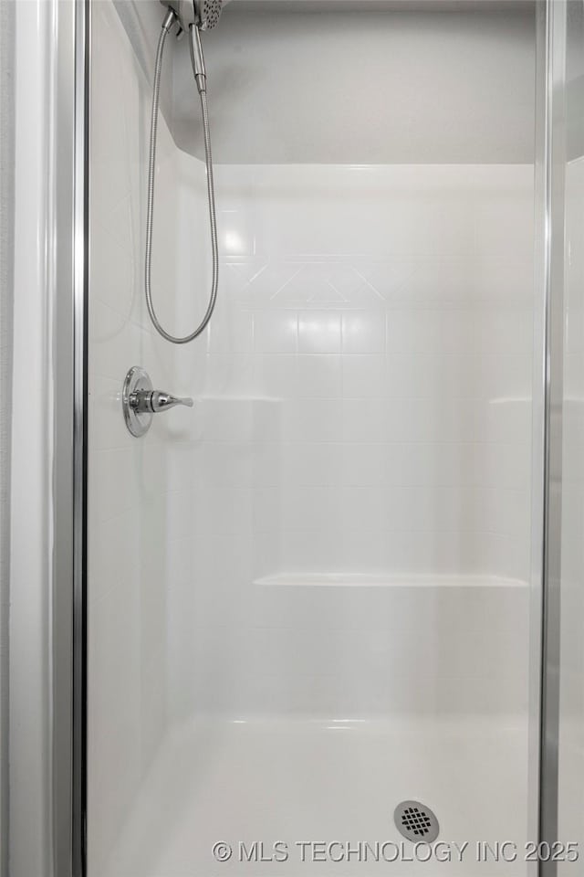 10387 S Nathan St, Jenks, OK 74037 - bathroom featuring a shower stall