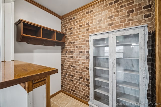1620 E Boston Ct, Broken Arrow, OK 74012 - mudroom with crown molding, brick wall, and light tile patterned floors
