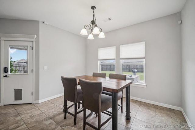 1620 E Boston Ct, Broken Arrow, OK 74012 - dining space featuring a chandelier and baseboards