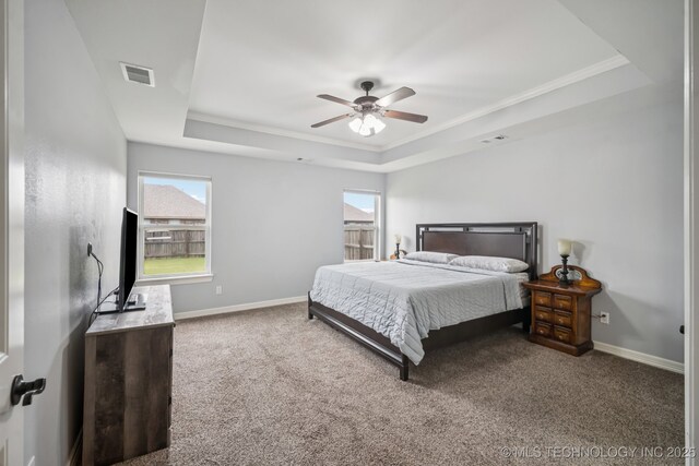 1620 E Boston Ct, Broken Arrow, OK 74012 - carpeted bedroom featuring a raised ceiling, crown molding, and ceiling fan