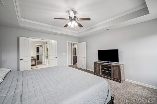 1620 E Boston Ct, Broken Arrow, OK 74012 - carpeted bedroom featuring a raised ceiling, ornamental molding, and ceiling fan