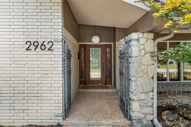 2962 E 56th Ct, Tulsa, OK 74105 - property entrance featuring brick siding